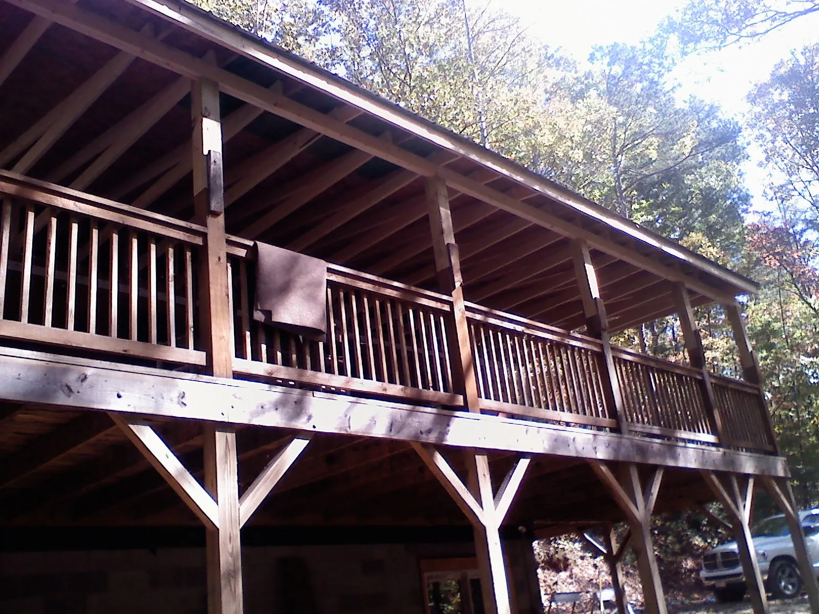 Timber framing under a new elevated porch and deck — Roof Leak Repair in Lake In The Hills by Roofing Brothers